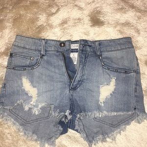 High waisted studded denim shorts.